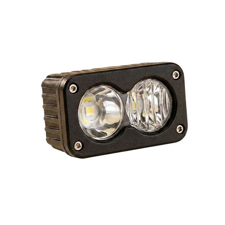 A rugged rectangular LED light fixture with a black metal housing, two front LED lenses, and four visible mounting screws, shown on a plain white background.