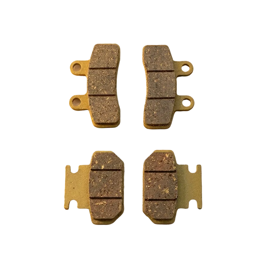 Four brake pads on a textured beige surface with 'Soleil Supplies' branding.