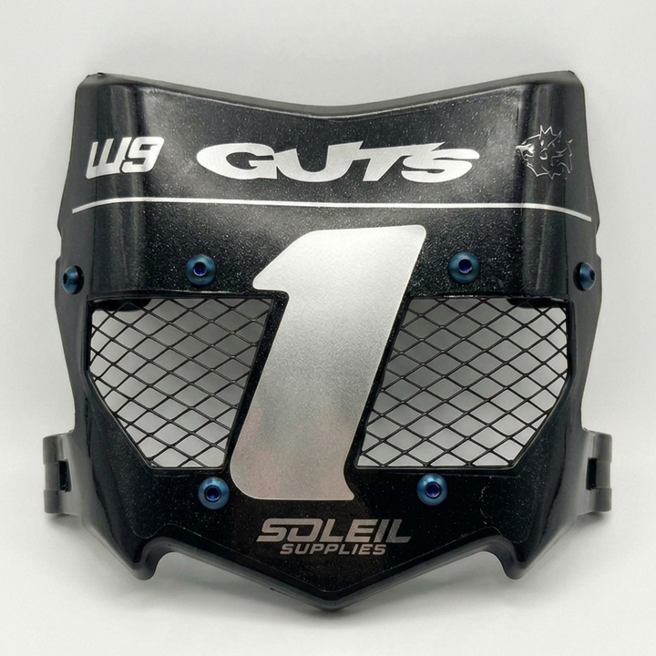 Black and silver motocross or dirt bike neck guard with blue adjustment screws, featuring 'GUTS' and 'SOLEIL SUPPLIES' branding on a light gray background.