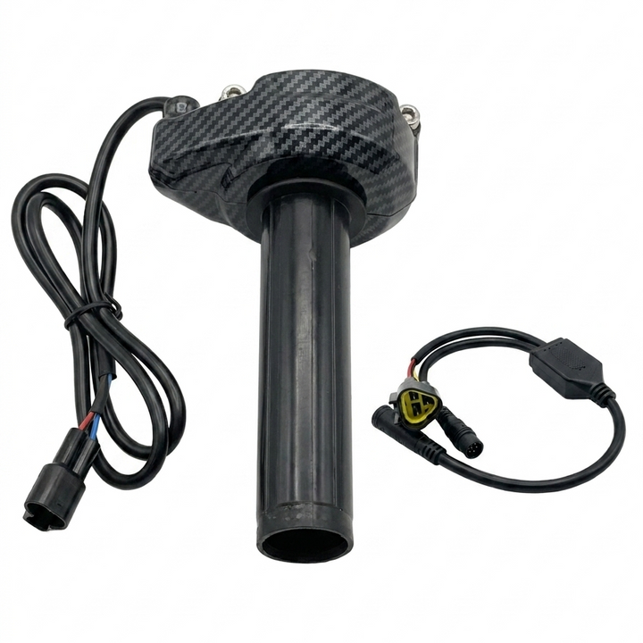 A black cylindrical automotive sensor or module with a carbon fiber pattern top cap, shown with two attached black wiring harnesses on a plain white background.
