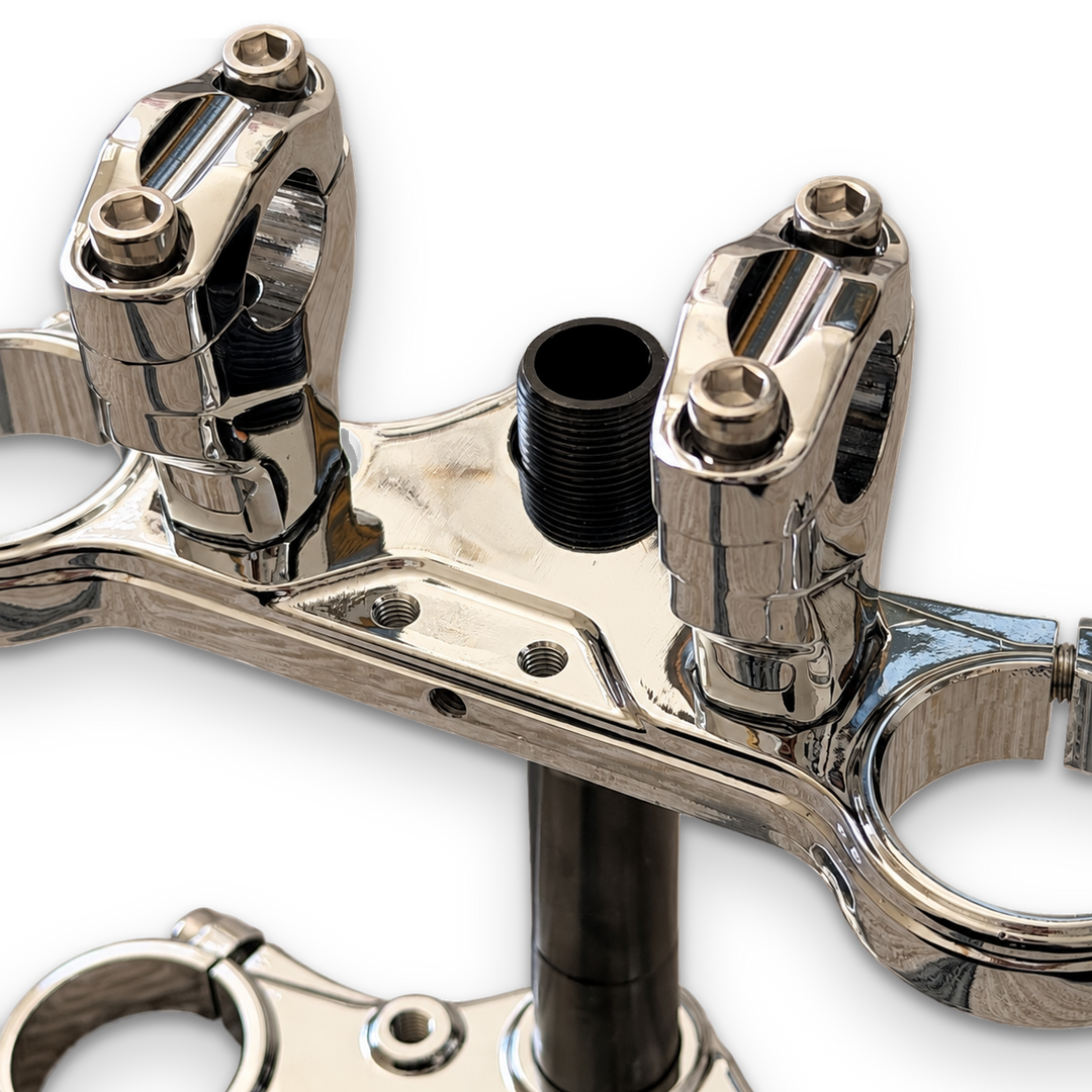 Tuttio Chrome Triple Clamp Set in Mirror Chrome — close-up of handlebar risers