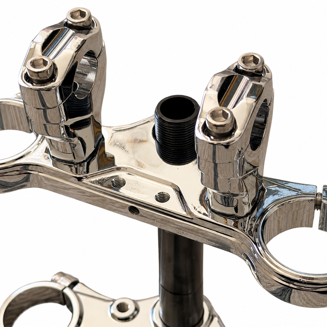 Tuttio Chrome Triple Clamp Set in Mirror Chrome — close-up of handlebar risers